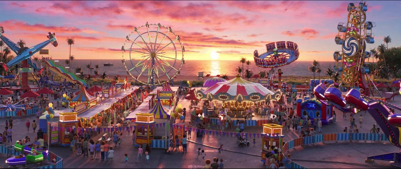 Toy Story 4 (2019) movie still: establishing — An amusement park sits by a beach under a vibrant sunset with colorful rides. Numerous small figures…