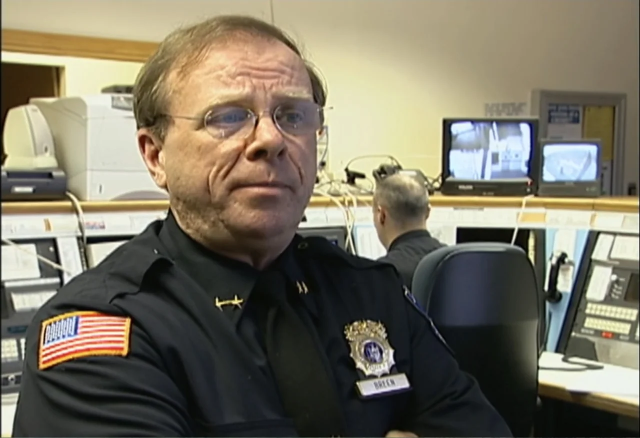 Indian Point: Imagining the Unimaginable (2004) movie still: medium — A police dispatch center features computer monitors, cabling, and technical…