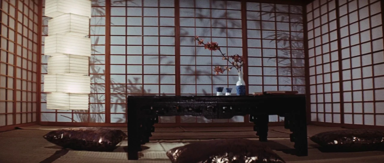 Diamonds Are Forever (1971) movie still: wide — A traditional Japanese room features shoji screen walls casting shadows of bamboo foliage. A low,…