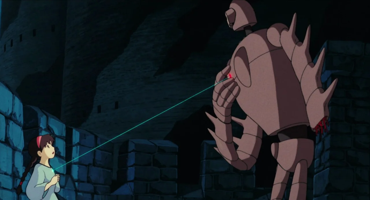 Castle in the Sky (1986) movie still: wide — A dark, ancient stone fortification wall at night stands under a clear sky. A young girl confronts a…