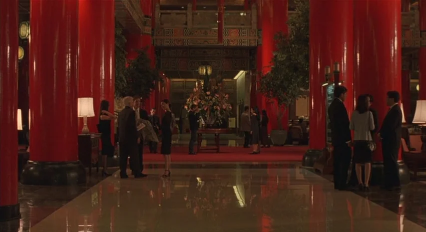 Yi-Yi (A One and A Two) (2000) movie still: A quiet, sophisticated night at a luxury hotel lobby where guests mingle in small, intimate clusters…
