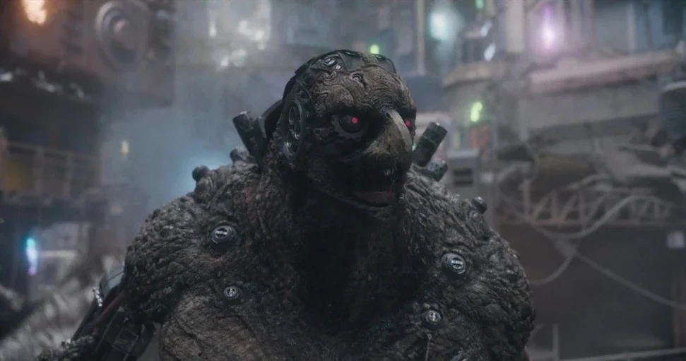 Guardians of the Galaxy Vol. 3 (2023) movie still: medium — A dark, industrial city setting filled with metallic structures and thick, hazy…