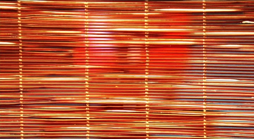 Gray’s Anatomy (1996) movie still: closeup — A close-up view of horizontal wooden bamboo blind slats layered in a repeating pattern. Light filters…