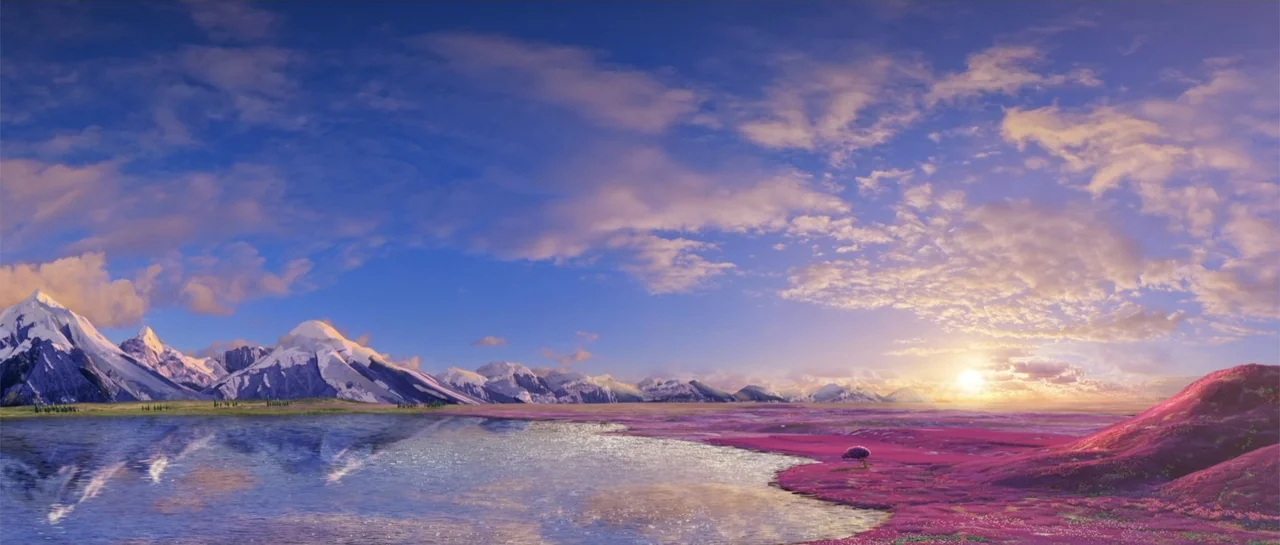 Cinderella and the Secret Prince (2018) movie still: establishing — A vast mountain range rises behind a calm lake under a colorful sunset sky. The…