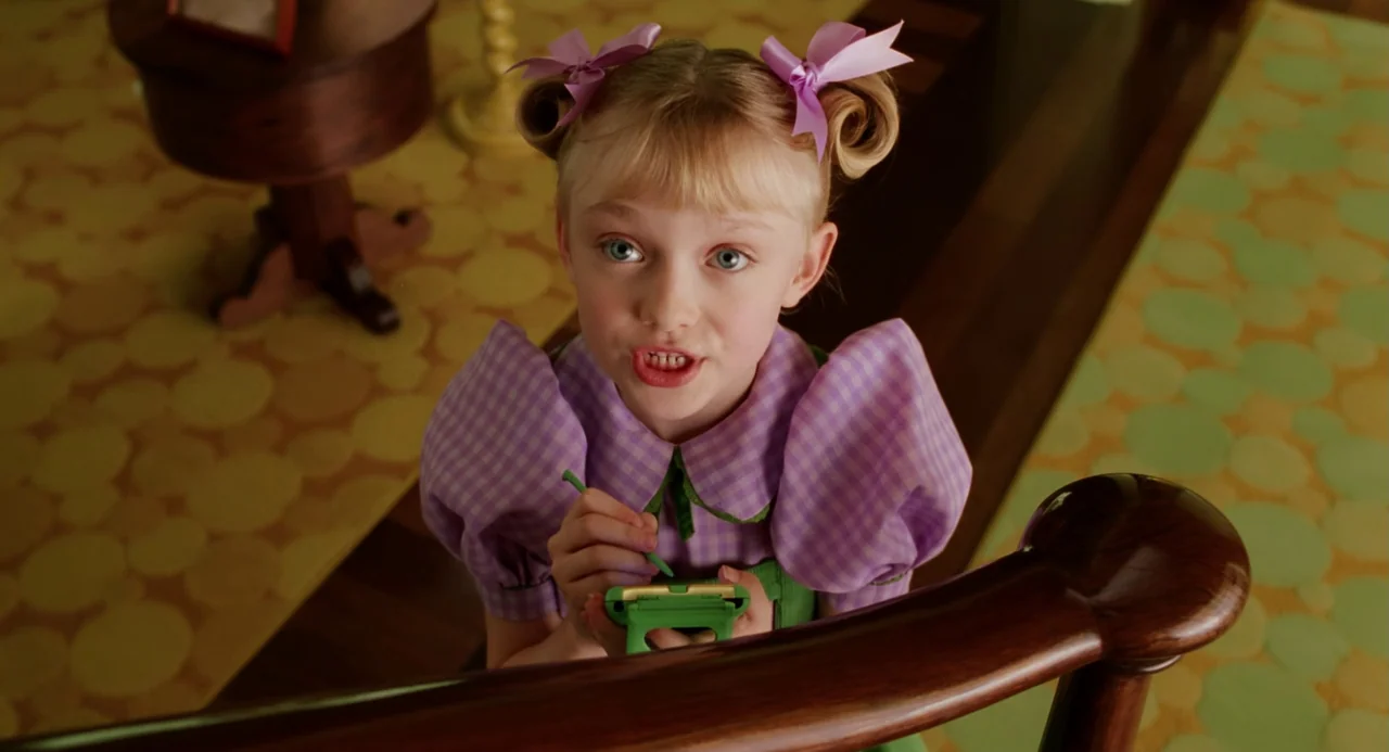 The Cat In The Hat (2003) movie still: medium — A brightly lit staircase interior features patterned green and yellow flooring and wooden railings.…