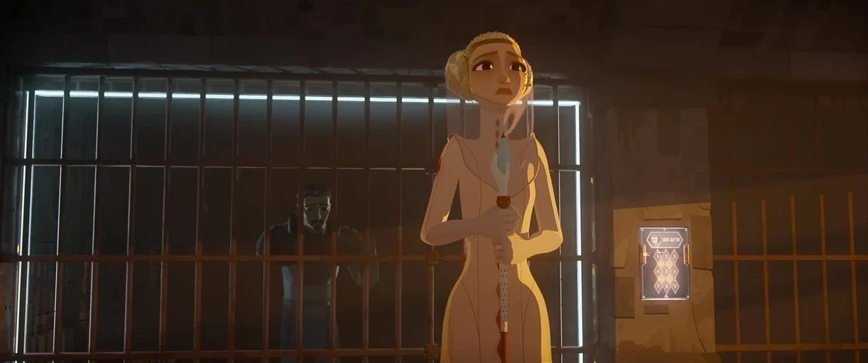Nimona (2023) movie still: medium — A dimly lit stone enclosure features vertical metal bars and a glowing numeric keypad. A blonde woman stands in…
