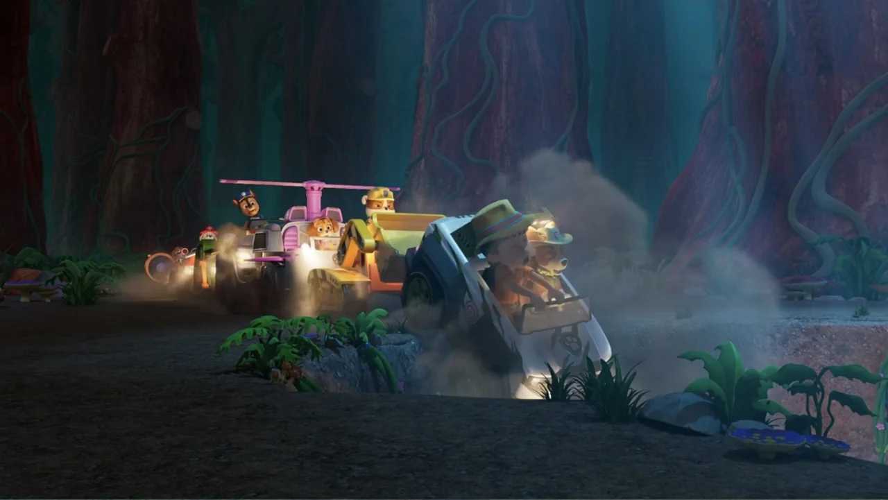 Valiente: A Tracker Story (2025) movie still: wide — A dense, dark jungle environment features towering trees with hanging vines and low vegetation.…