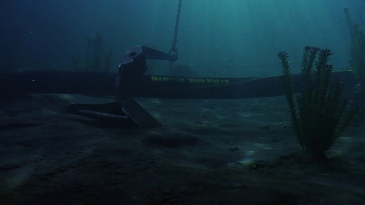 Friday the 13th Part VIII: Jason Takes Manhattan (1989) movie still: wide — The sandy bottom of a murky body of water is partially visible. A heavy…