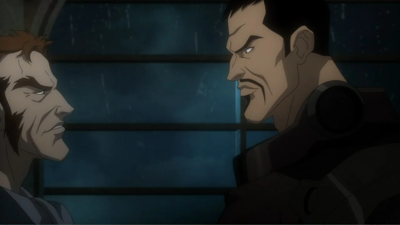 Batman: Assault on Arkham (2014) movie still: medium — A dimly lit indoor space with a dark window backdrop featuring faint blue light. Two men…