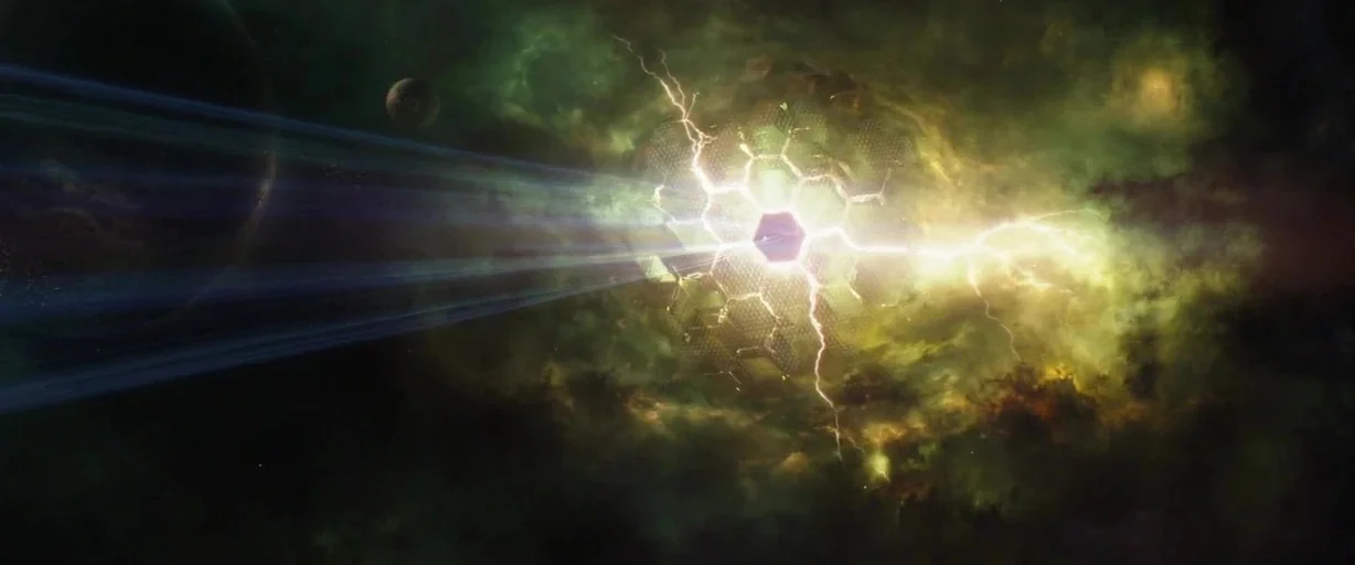Avengers: Endgame (2019) movie still: establishing — A complex, metallic, honeycombed geometric station sits suspended in a dense, dark green…