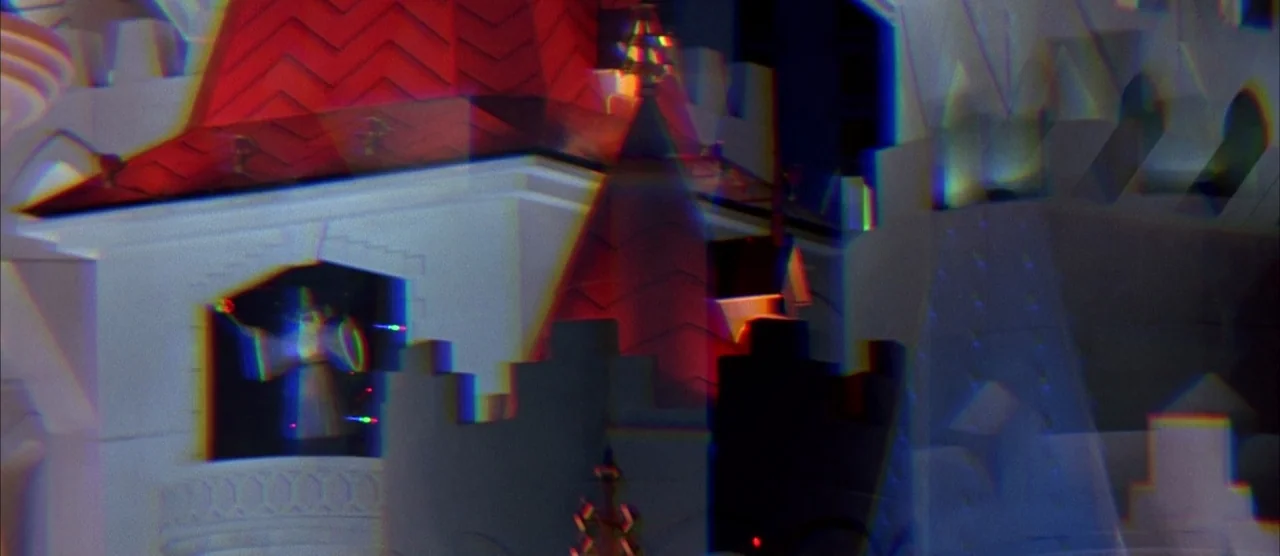 Casino (1995) movie still: wide — A miniature model of a fantasy castle features red spires and white fortified walls. Optical distortions create…