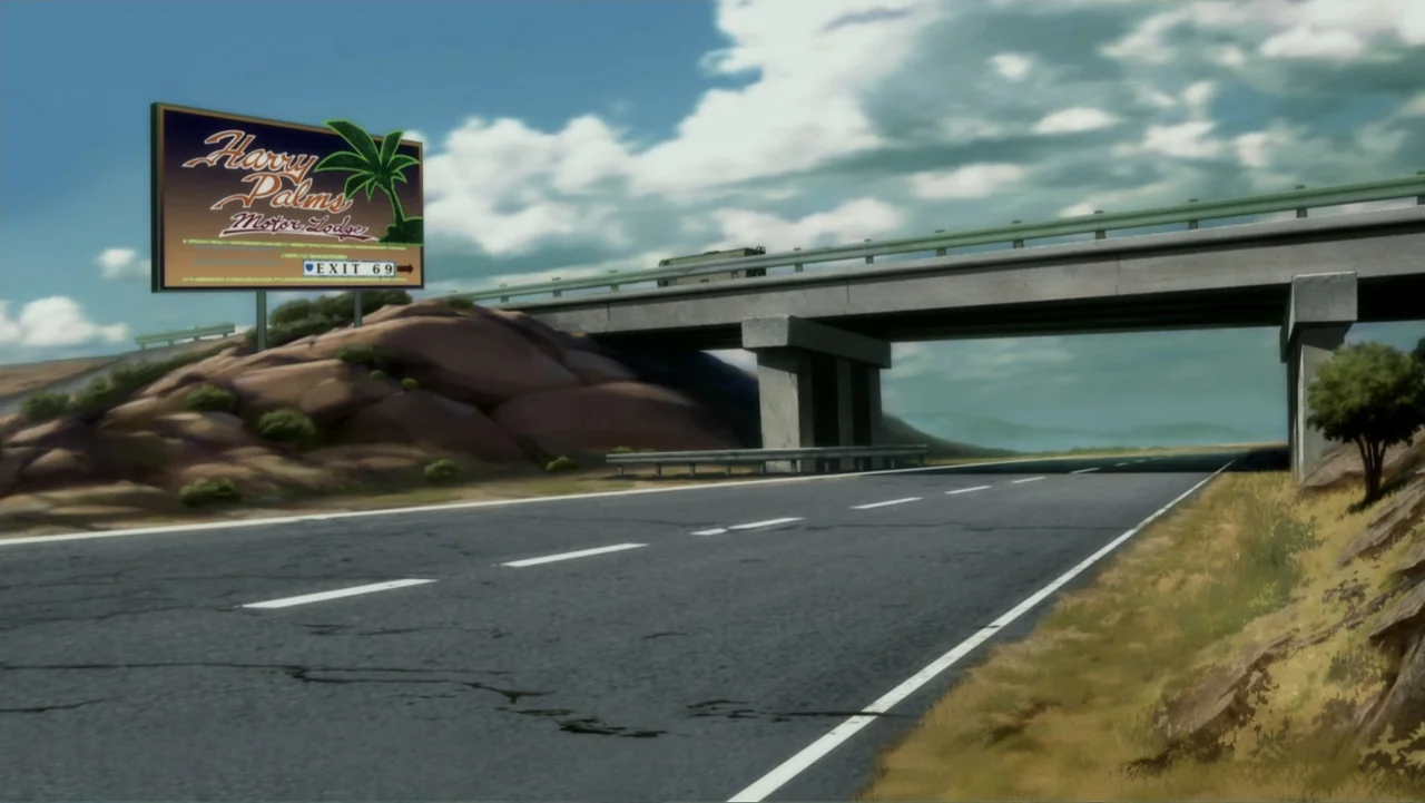 Suicide Squad: Hell to Pay (2018) movie still: establishing — A rural highway stretches under a concrete overpass near a rocky desert hill. A large…