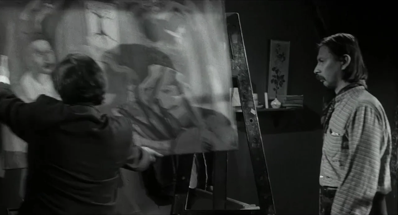 The Bohemian Life (1945) movie still: medium — An artist studio contains an easel and a framed painting held by an occupant. A man in a patterned…