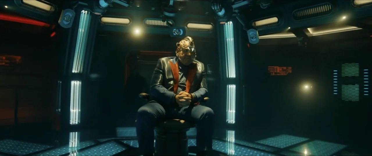 Star Trek: Section 31 (2025) movie still: medium — A dimly lit, high-tech spaceship bridge featuring dark metallic walls and neon accents. An…