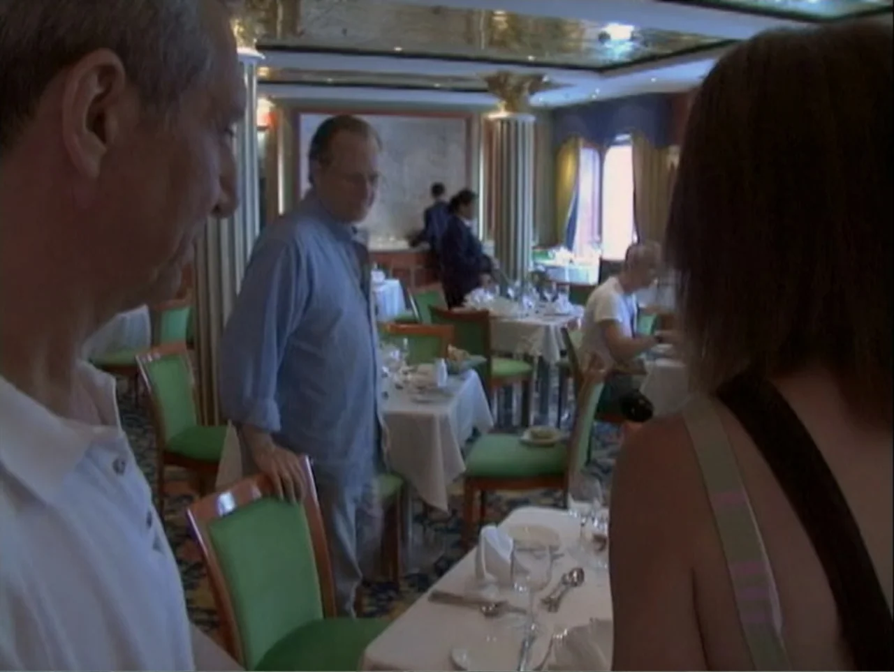 All Aboard! Rosie's Family Cruise (2006) movie still: medium — An interior restaurant dining area with green chairs and white tablecloths. A…