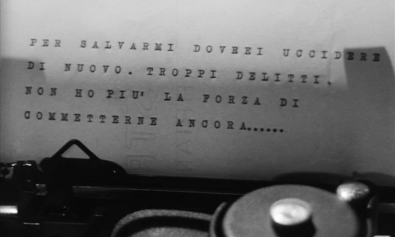 The Girl Who Knew Too Much (1963) movie still: closeup — A typewriter carriage holds a sheet of paper with Italian text typed in ink. The foreground…