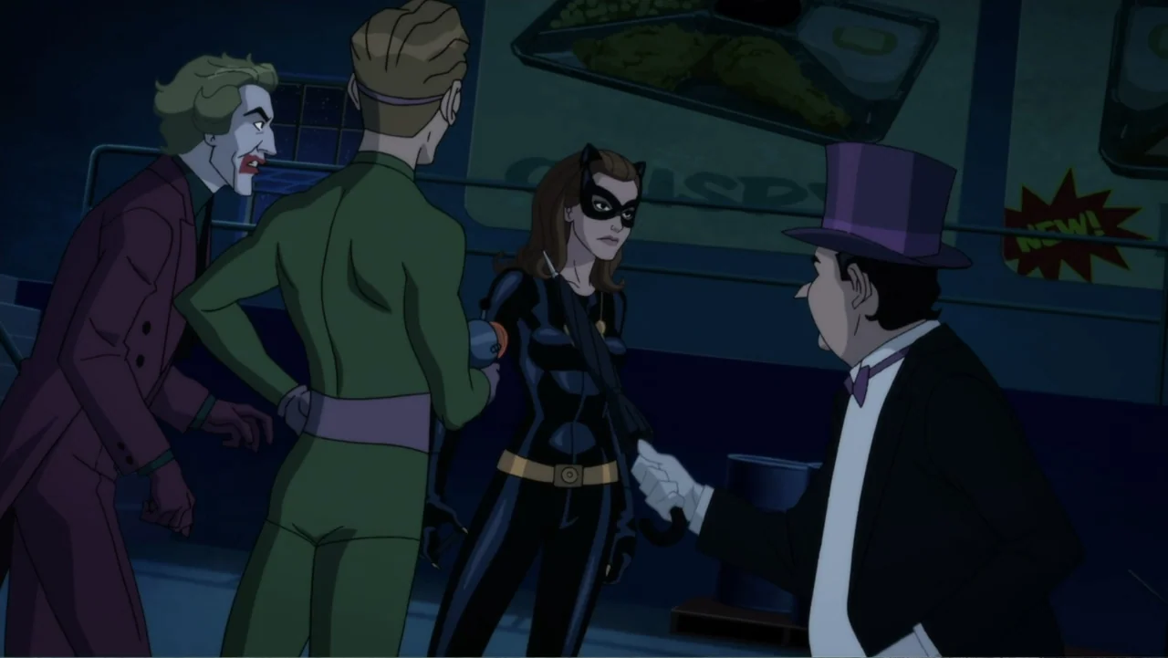 Batman: Return of the Caped Crusaders (2016) movie still: medium — A dark industrial interior features a group of four costumed figures standing…
