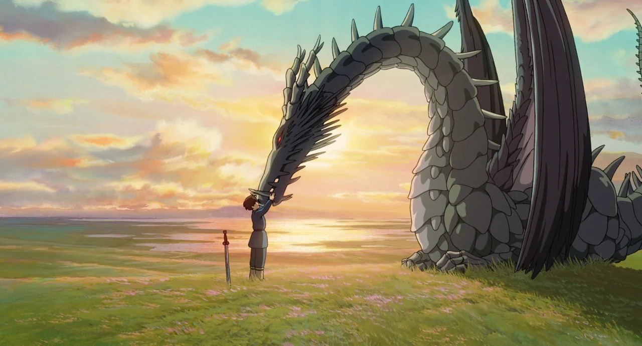 Tales From Earthsea (2006) movie still: wide — A sprawling green meadow stretches toward a horizon under a golden sunset sky. A young boy stands…