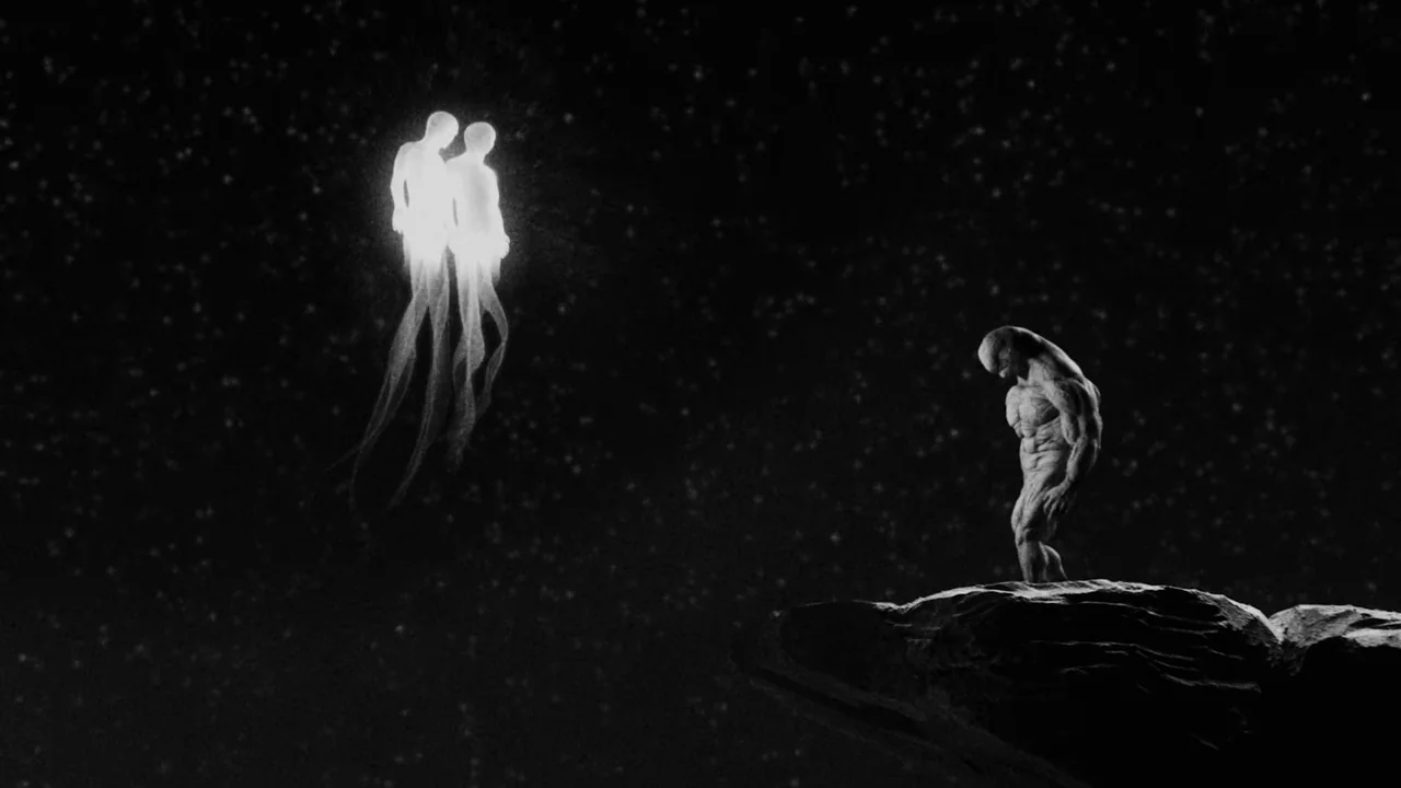 Divinity (2023) movie still: wide — A dark, starry void surrounds a jagged rock outcropping floating in empty space. A muscular figure stands on the…