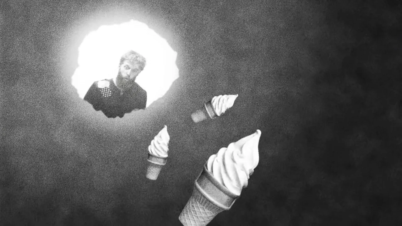 Hundreds of Beavers (2022) movie still: wide — A surreal void features a man emerging from a circular glow against dark grain. Three soft-serve ice…