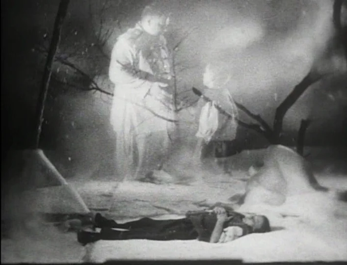 Archangel (1990) movie still: wide — A snowy, barren exterior landscape is depicted with a double-exposure effect showing ghostly figures. A small…