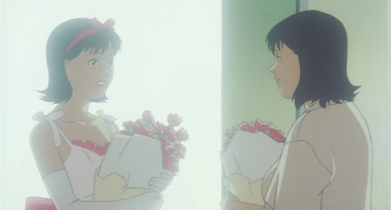 Perfect Blue (1997) movie still: medium — Two women stand in a brightly lit room filled with an overexposed white glow. Both figures hold identical…