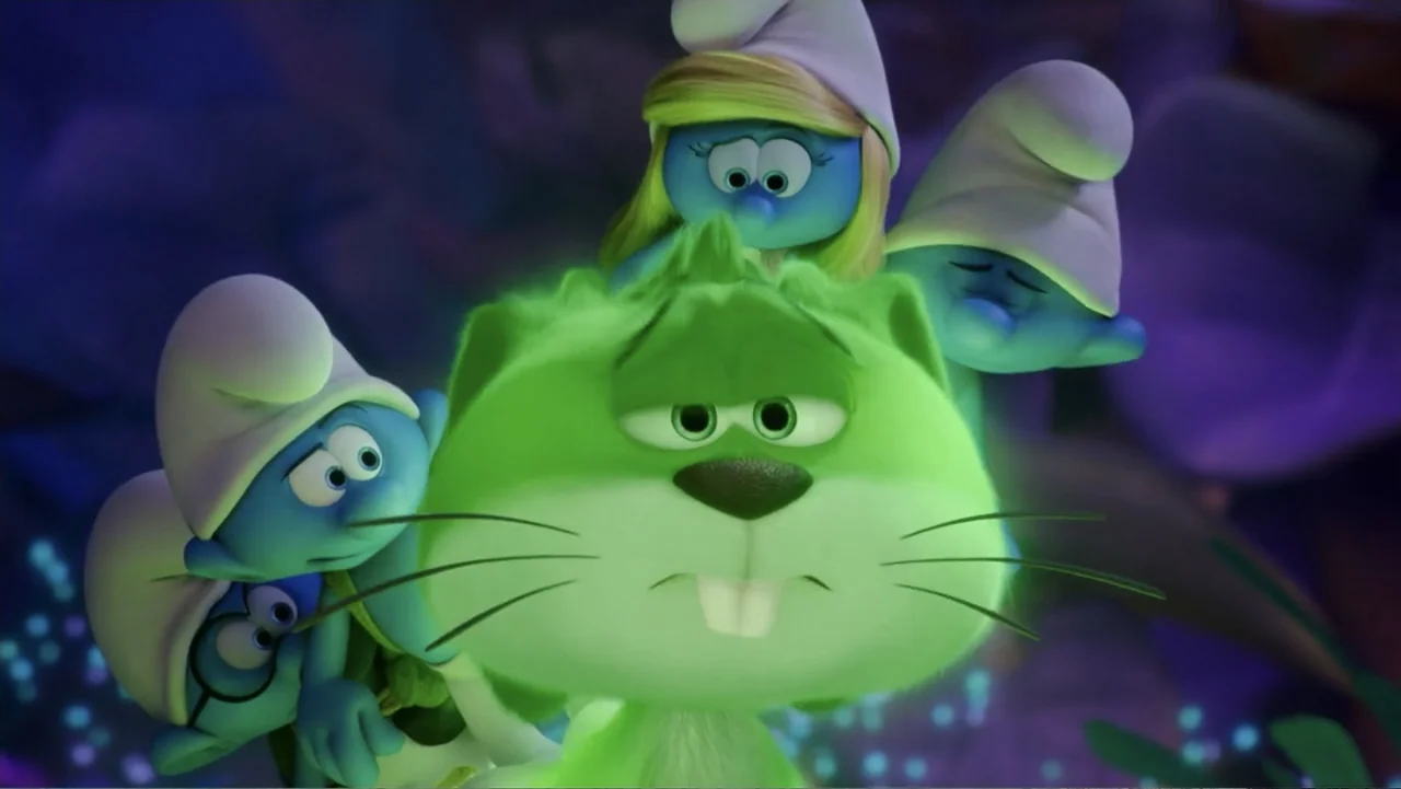 Smurfs: The Lost Village (2017) movie still: medium — A dark fantasy environment with bioluminescent elements in the background foliage. A fuzzy…