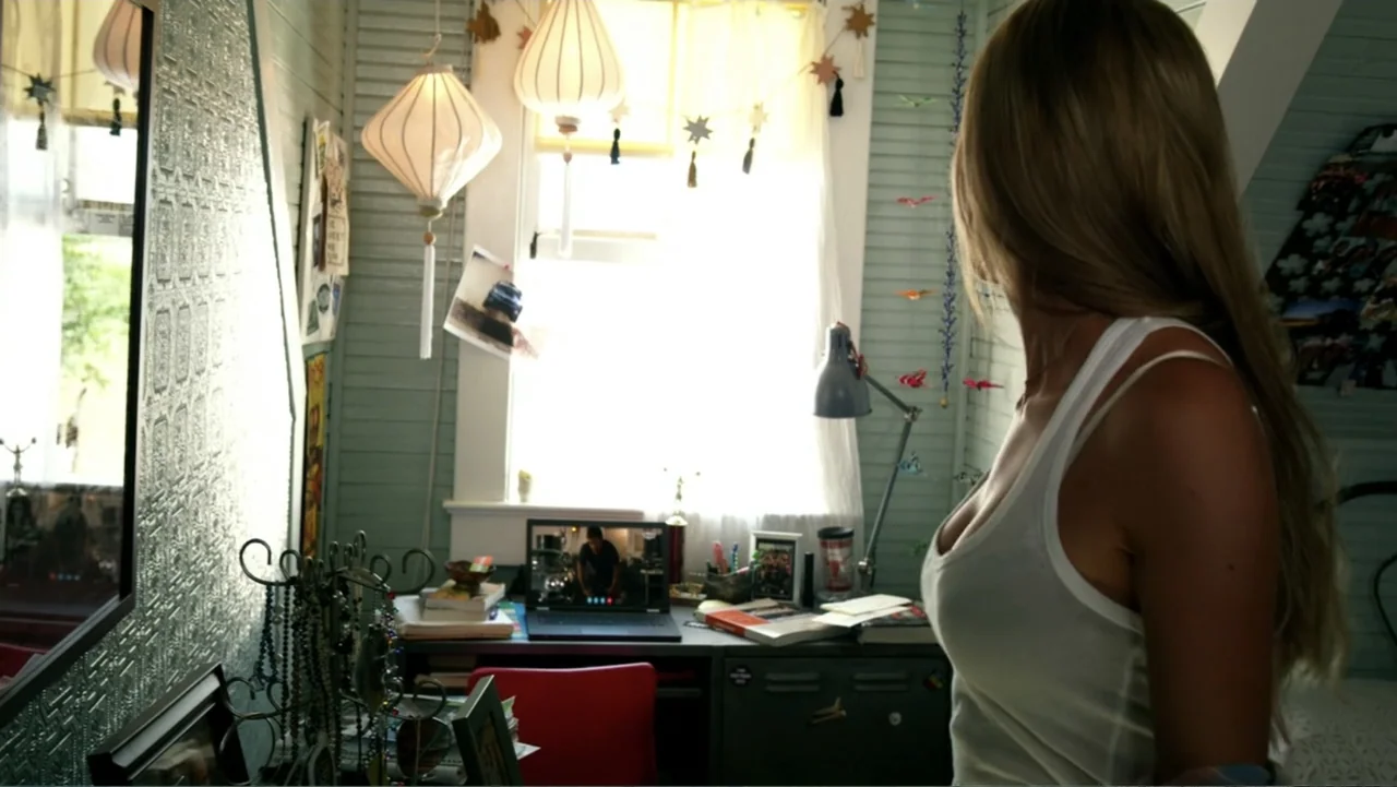 Transformers: Age of Extinction (2014) movie still: medium — A light green bedroom with patterned walls features a desk positioned beneath a bright…