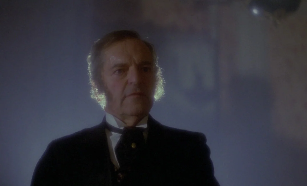 The Strange Case of Dr. Jekyll and Miss Osbourne (1981) movie still: medium — An interior Victorian parlor with atmospheric light filtering through…