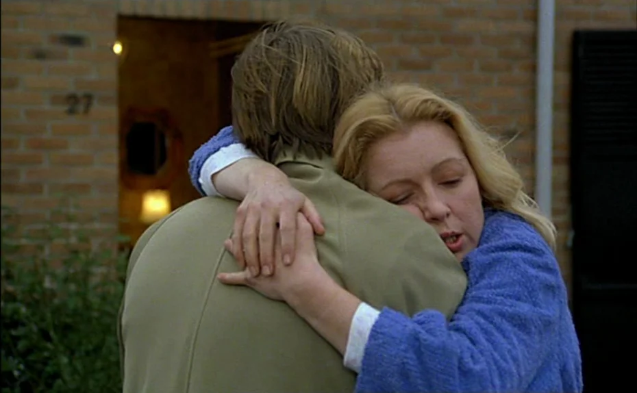 My American Uncle (Mon oncle d’Amérique) (1980) movie still: medium — The exterior of a brick house at night features a doorway with an interior…