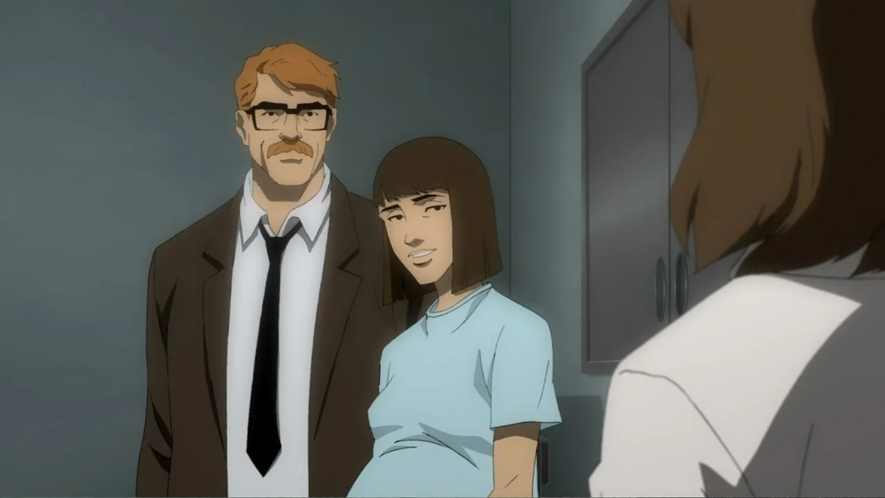 Batman: Year One (2011) movie still: medium — A sterile clinical room features smooth grey walls and a metallic wall cabinet. A man in a suit and a…