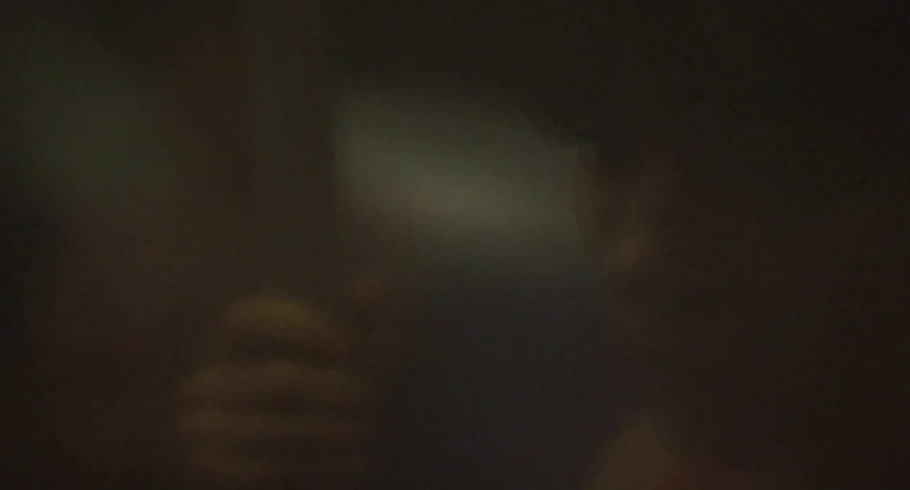 It Felt Like Love (2013) movie still: closeup — A completely blurred and out-of-focus image with no clear identifiable environment. No specific…