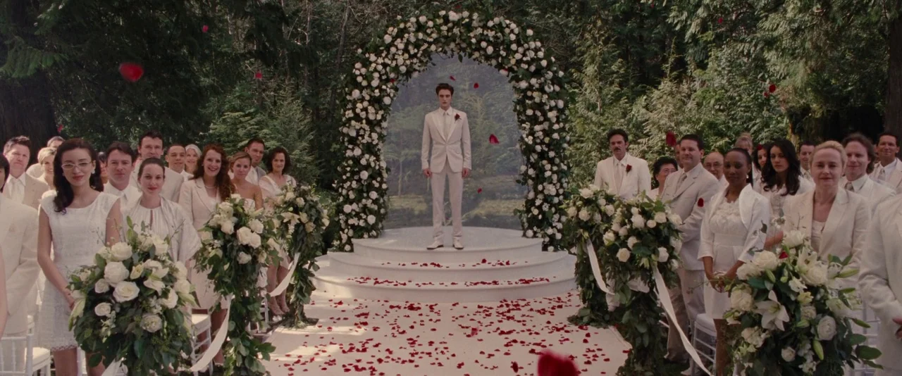 The Twilight Saga: Breaking Dawn – Part 1 (2011) movie still: wide — An outdoor wedding setup features a white circular platform under a large…