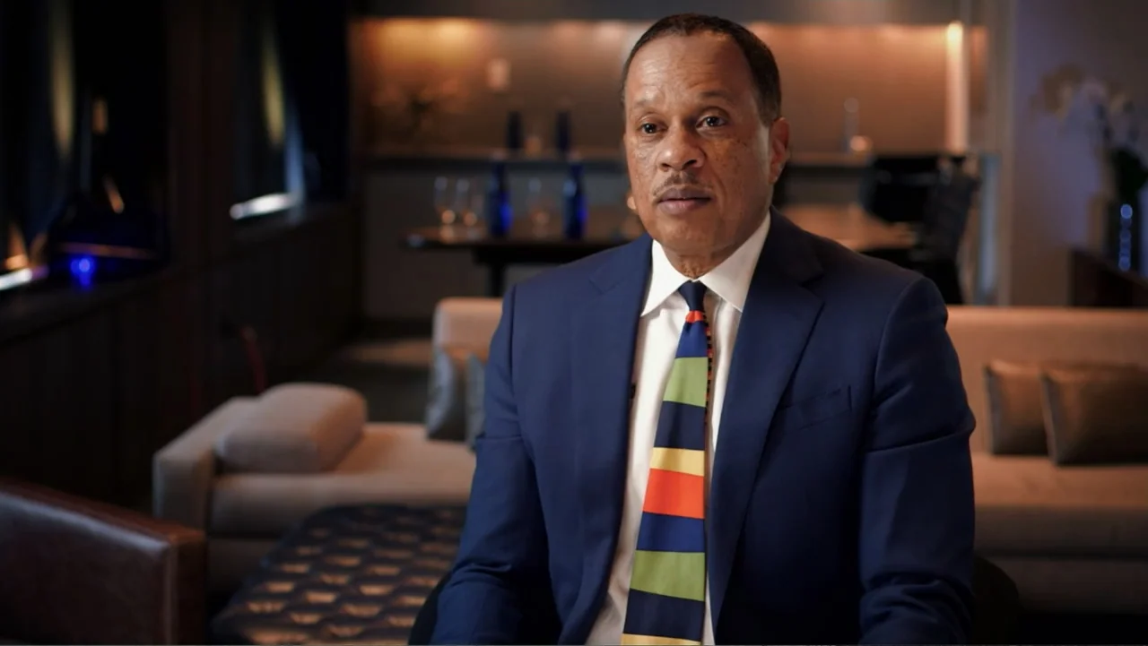 Ali & Cavett: The Tale of the Tapes (2018) movie still: medium — A professional office environment with blurred furniture in the background…