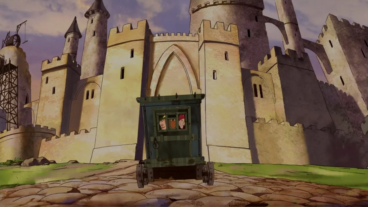Tom and Jerry: Robin Hood and His Merry Mouse (2012) movie still: wide — A stone fortification with tall towers looms over a dirt path at sunset.…