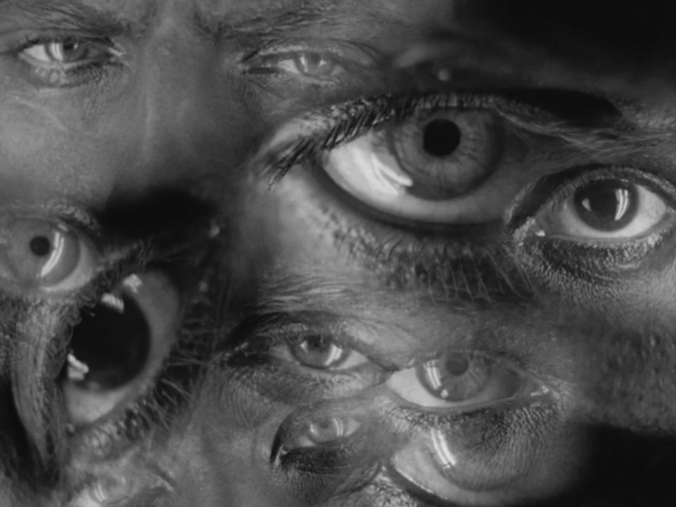 Metropolis (1927) movie still: closeup — A dense composite of multiple human eyes layered over each other in black and white. The individual eyes…