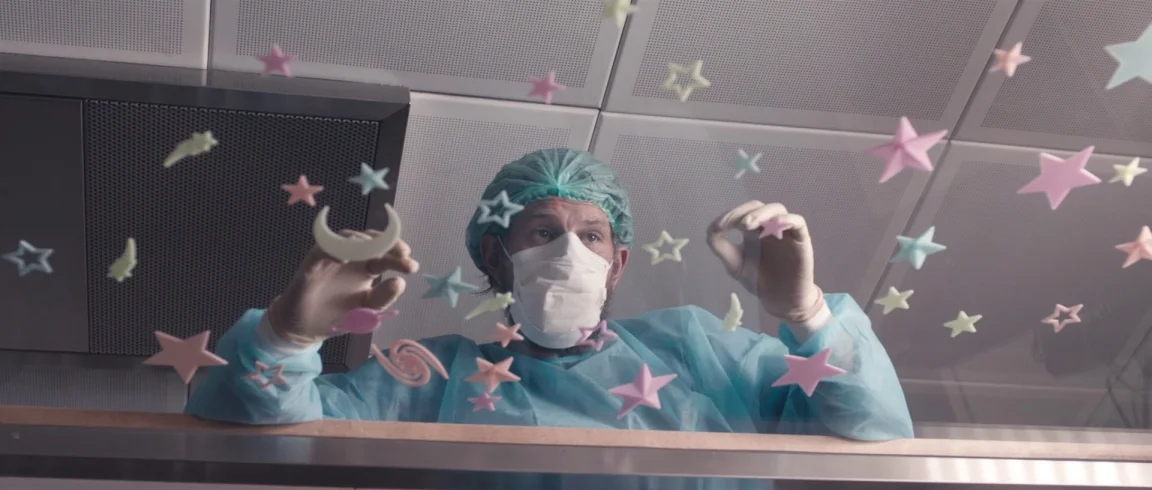 Broken Circle Breakdown (2012) movie still: medium — A hospital partition features numerous colorful plastic stars and moon shapes attached to…
