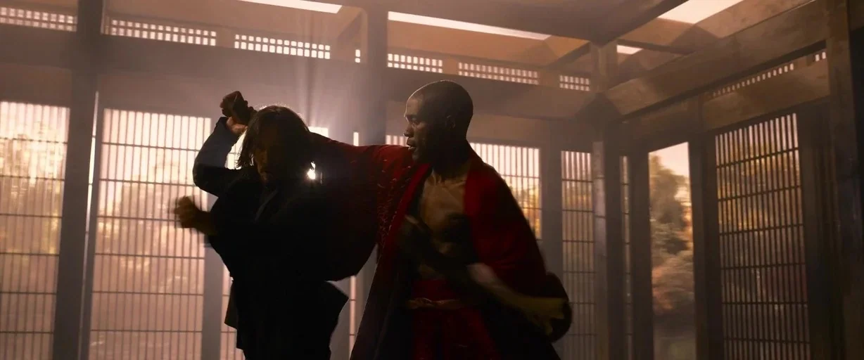 The Matrix Resurrections (2021) movie still: medium — A spacious room features traditional Japanese sliding shoji paper screens and wooden…