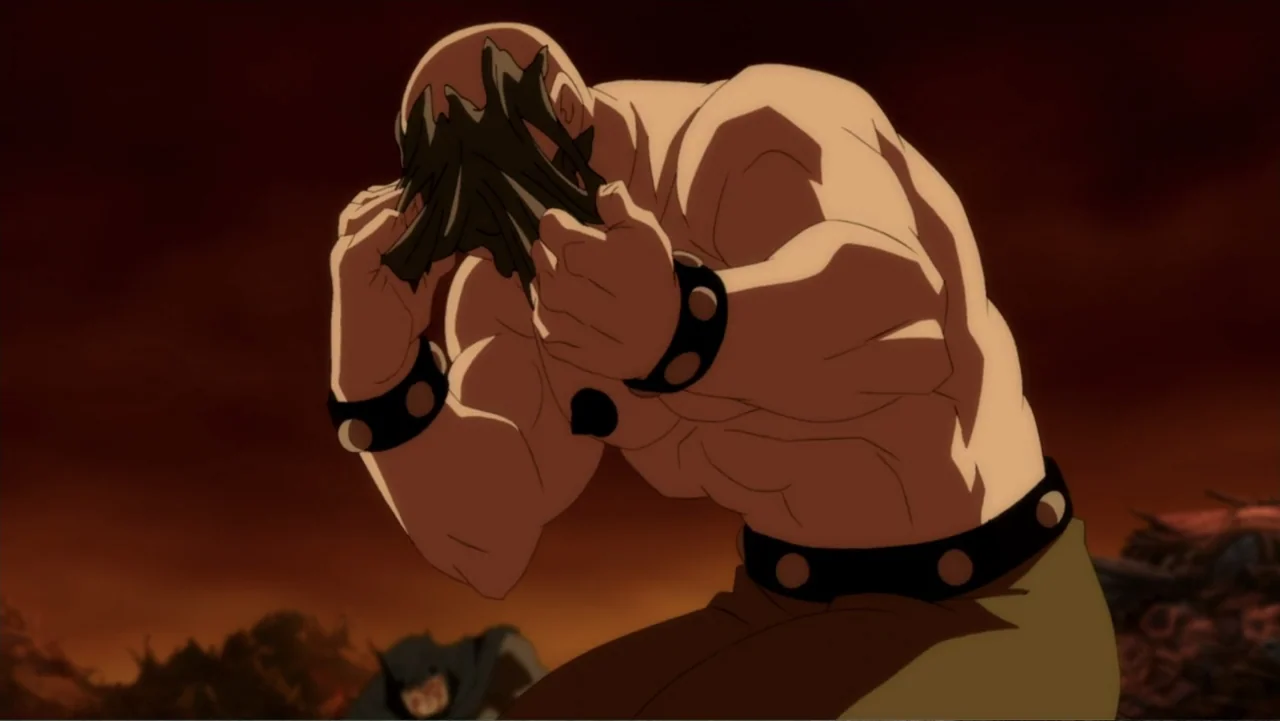 Batman: The Dark Knight Returns, Part 1 (2012) movie still: medium — A desolate, dark wasteland features piles of debris under a deep orange sky. A…