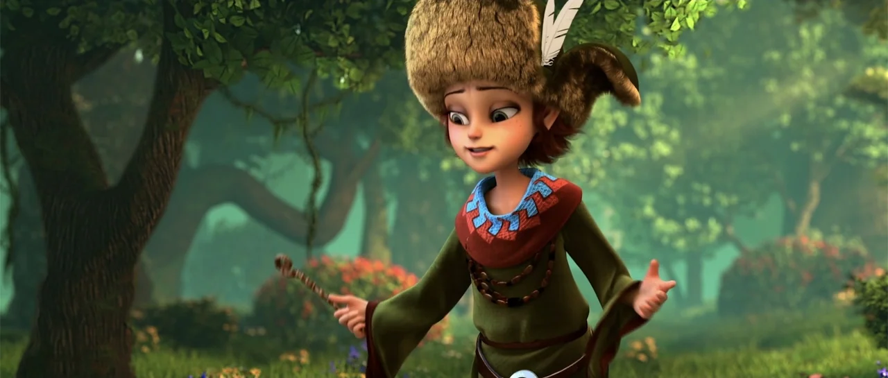 Cinderella and the Secret Prince (2018) movie still: medium — A sunlit woodland glade features lush green grass and dense, leafy trees. A young girl…