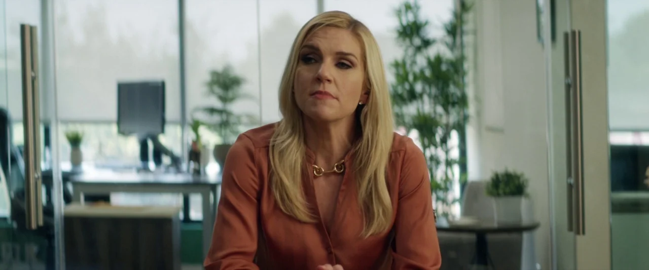 Seven Stages to Achieve Eternal Bliss (2018) movie still: medium — A modern professional workplace with glass walls and indoor plants in the…