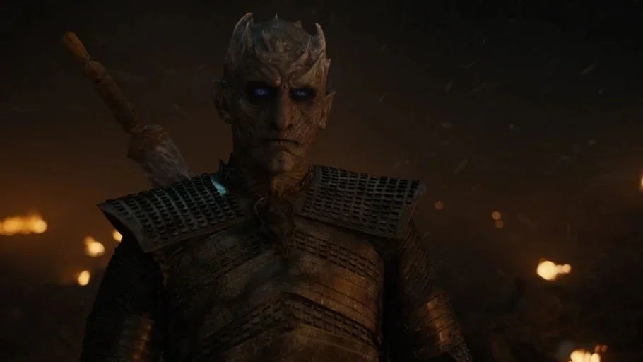 Game of Thrones: The Last Watch (2019) movie still: medium — A dark, smoke-filled battlefield is illuminated by distant fires at night. The Night…