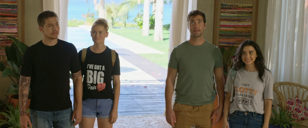 Beautiful Wedding (2024) movie still: fullbody — A bright lobby with tiled floors and tropical greenery leads toward an outdoor deck. Four young…