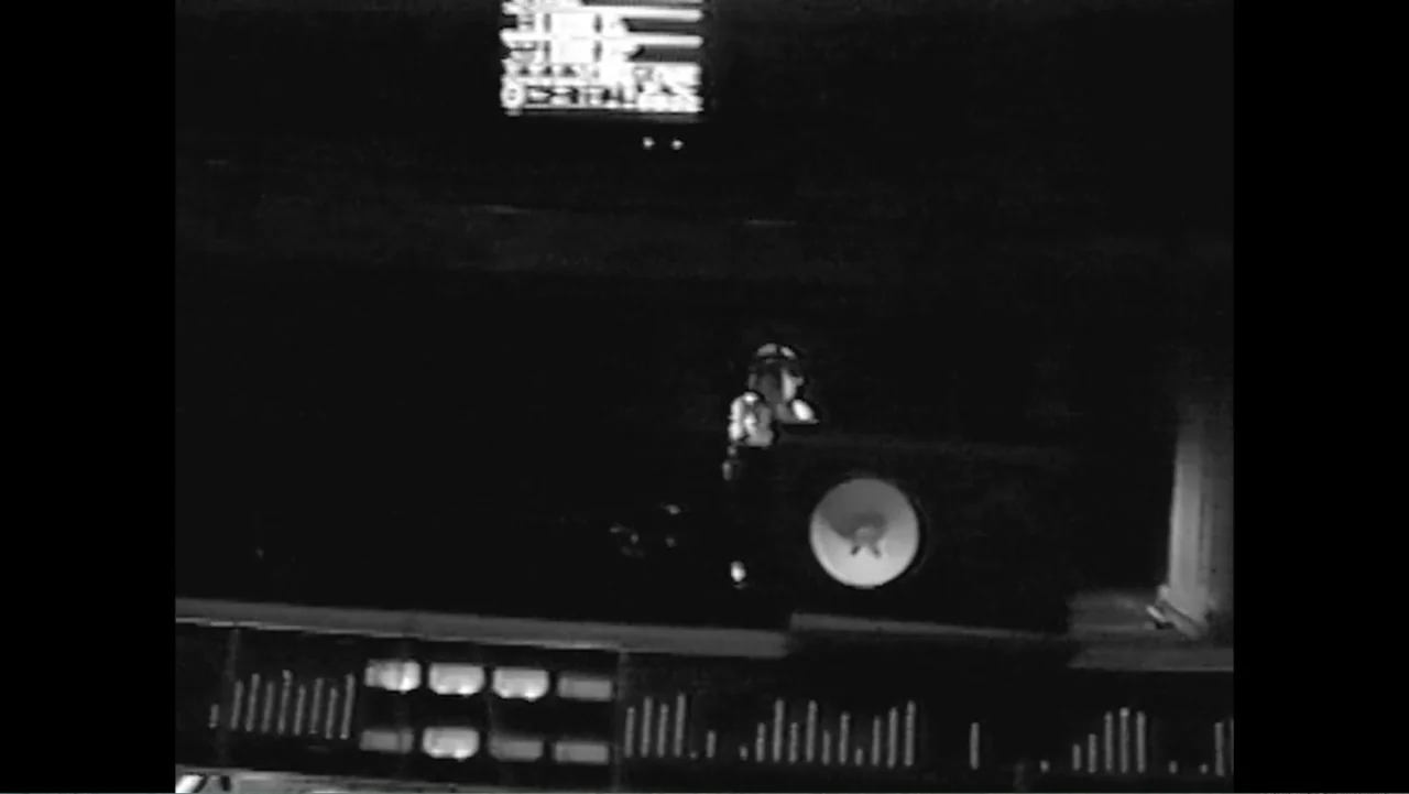 Mary J. Blige's My Life (2021) movie still: wide — A dark, dimly lit studio room contains electronic audio equipment with glowing displays. A…
