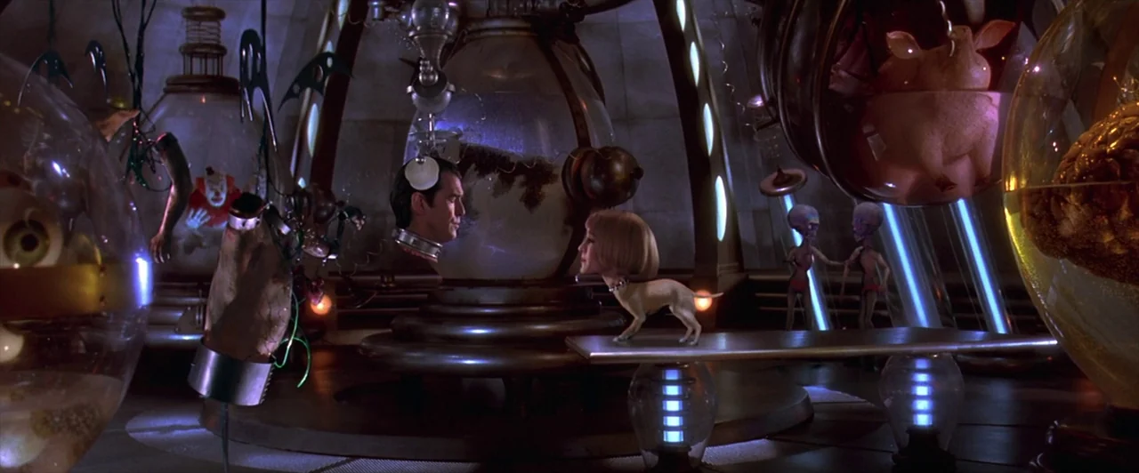 Mars Attacks! (1996) movie still: wide — A futuristic laboratory contains large transparent containers filled with preserved specimens and…