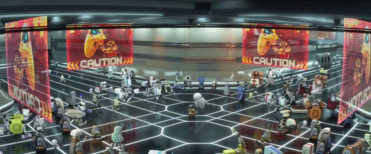 Wall-E (2008) movie still: wide — A spacious futuristic maintenance bay with a black gridded floor and large overhead screens. Many diverse small…
