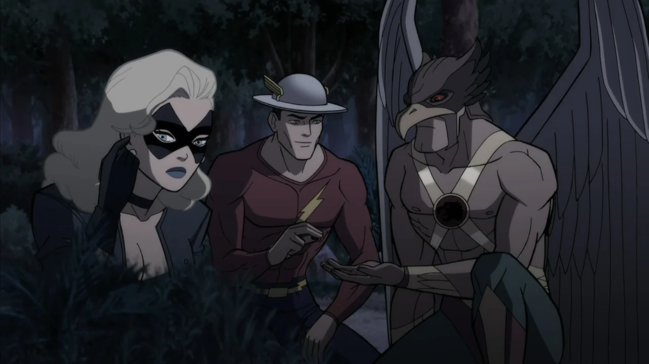 Justice Society: World War II (2021) movie still: medium — A dark, dense outdoor area with silhouettes of trees visible in the background. Three…