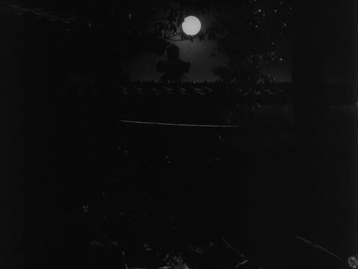 Sanshiro Sugata (1943) movie still: establishing — A dark night view shows a full moon positioned above a traditional tiled roof. Foliage obscures…