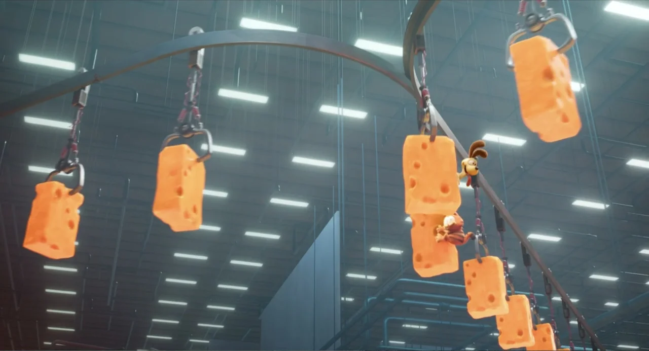 The Garfield Movie (2024) movie still: wide — An industrial food processing facility features a complex ceiling system with suspended conveyor…