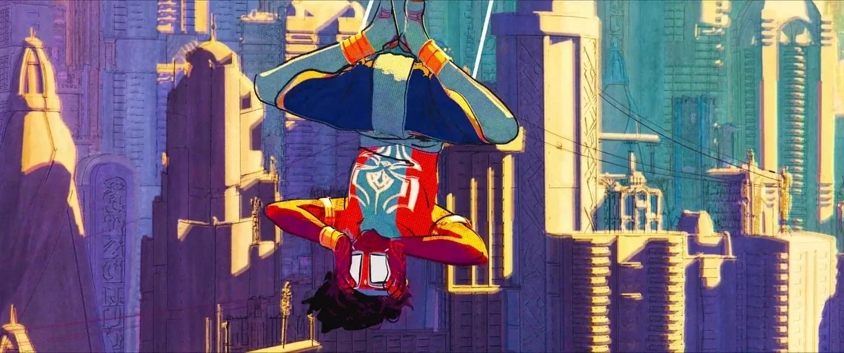 Spider-Man: Across the Spider-Verse (2023) movie still: medium — A dense urban environment features stylized architecture bathed in bright, warm…